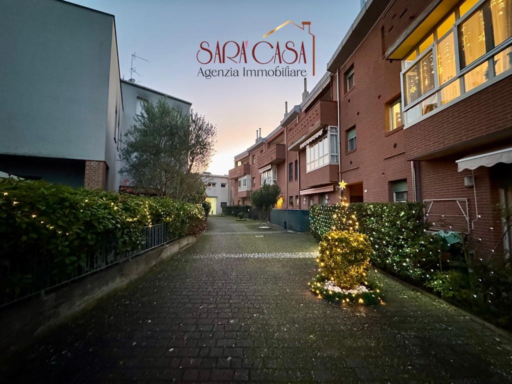 Luminoso appartamento con due camere, terrazzo e garage