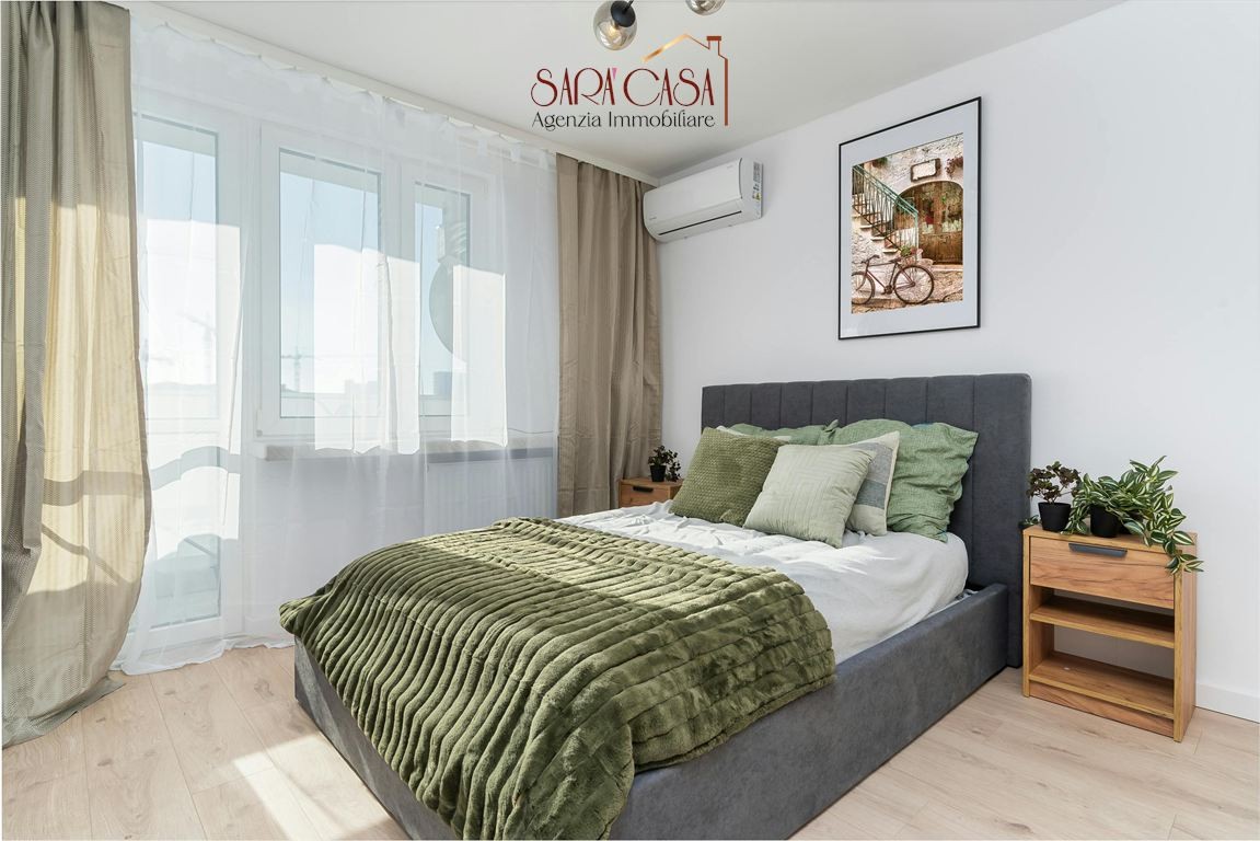 BILOCALE CON SPELNDIDO TERRAZZO E POSTO AUTO