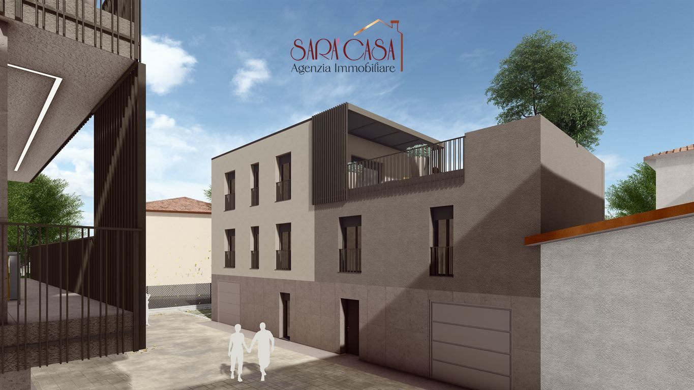 Appartamento con ampio giardino, garage e posto auto