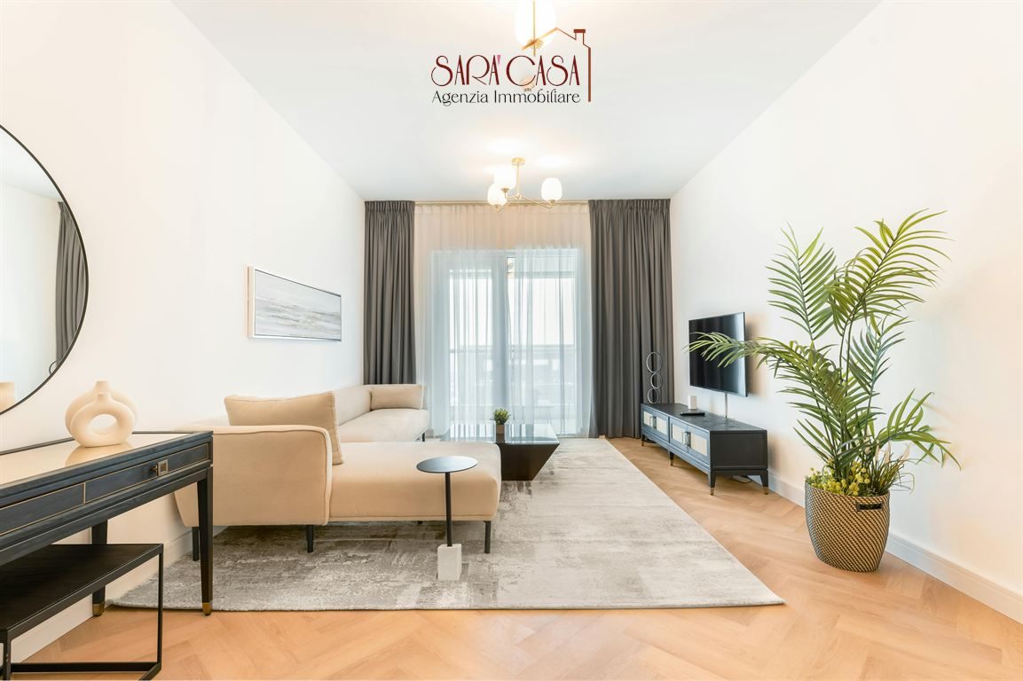 Appartamento con tre camere da letto e giardino esclusivo