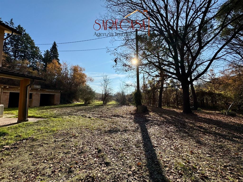 CASA INDIPENDENTE CON TERRENO