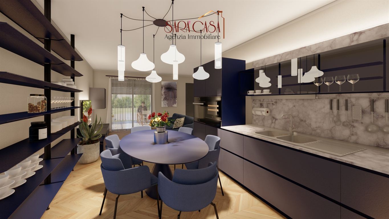 APPARTAMENTO CON DUE CAMERE, BALCONE, GARAGE E POSTI AUTO